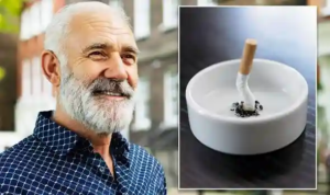Outdoor scene showing a person in a blue patterned shirt near a white ashtray with a bent cigarette butt and scattered ashes—evoking the habit of smoking and its lingering presence.